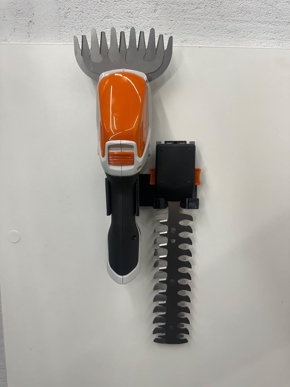 STIHL HSA26 Hedge Trimmer and Accessory Wall Mount