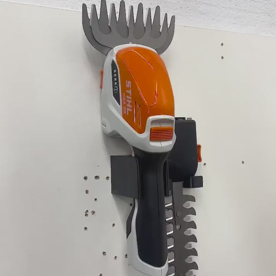 STIHL HSA26 hedge trimmer and accessory front wall mount for garage or shed video