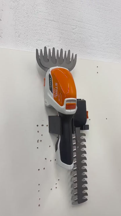 STIHL HSA26 hedge trimmer and accessory front wall mount for garage or shed video